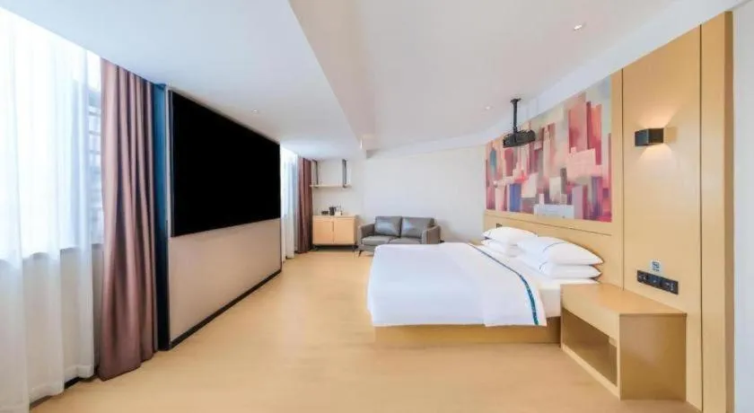 Bed in City Comfort Inn Huize Ancient City