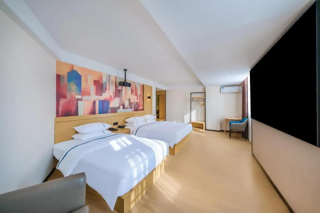 Bed in City Comfort Inn Huize Ancient City