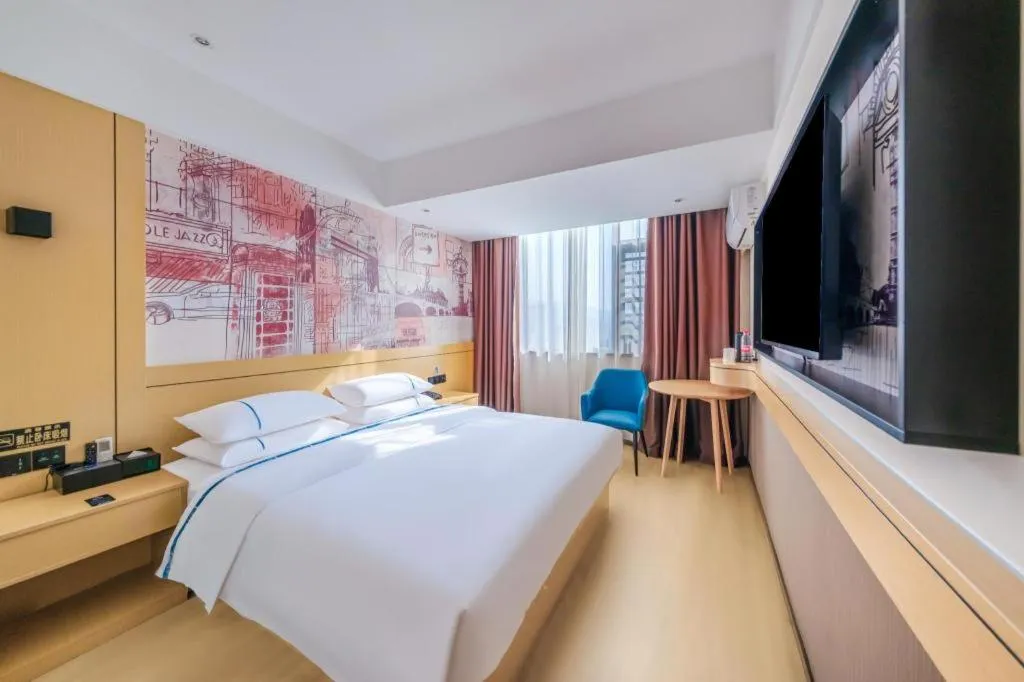 Bed in City Comfort Inn Huize Ancient City