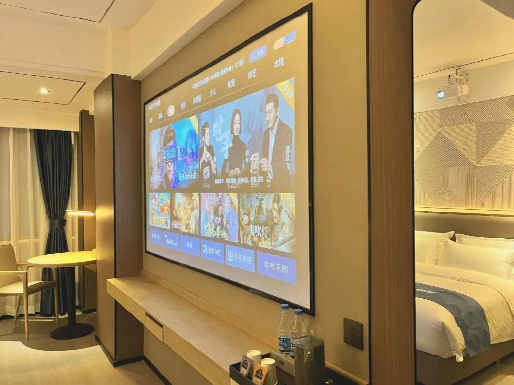 Bed in Borrman Hotel Wanning Wenming Road High-speed Railway Station