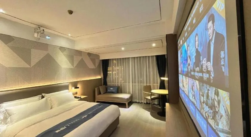 Bed in Borrman Hotel Wanning Wenming Road High-speed Railway Station