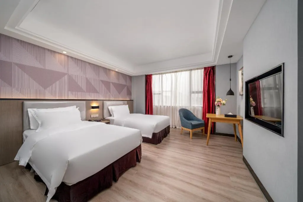 Bed in Borrman Hotel Guangzhou Xinshi Baixin Plaza Qifu Road