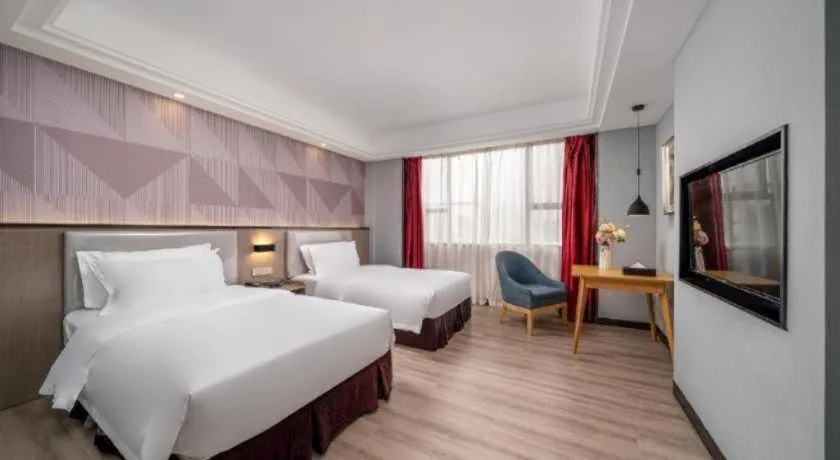 Bed in Borrman Hotel Guangzhou Xinshi Baixin Plaza Qifu Road