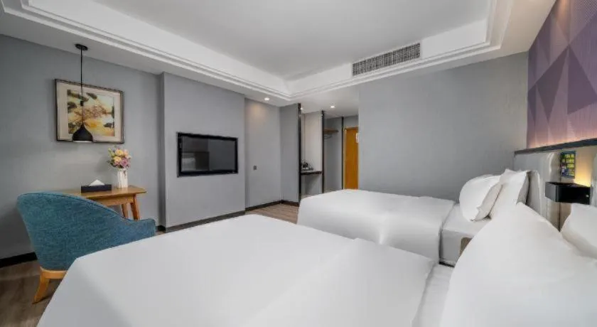 Bed in Borrman Hotel Guangzhou Xinshi Baixin Plaza Qifu Road