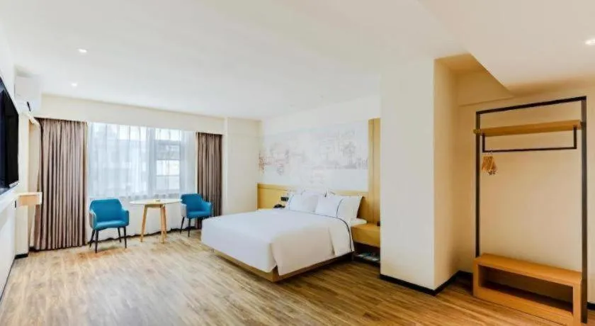 Bed in City Comfort Inn Shaorao Poyang