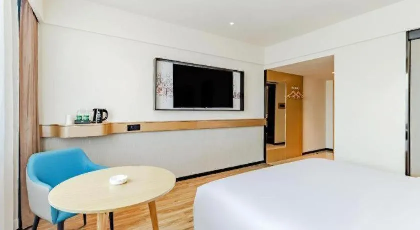 Bed in City Comfort Inn Shaorao Poyang