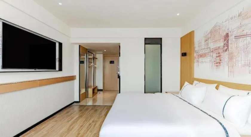 Bed in City Comfort Inn Shaorao Poyang