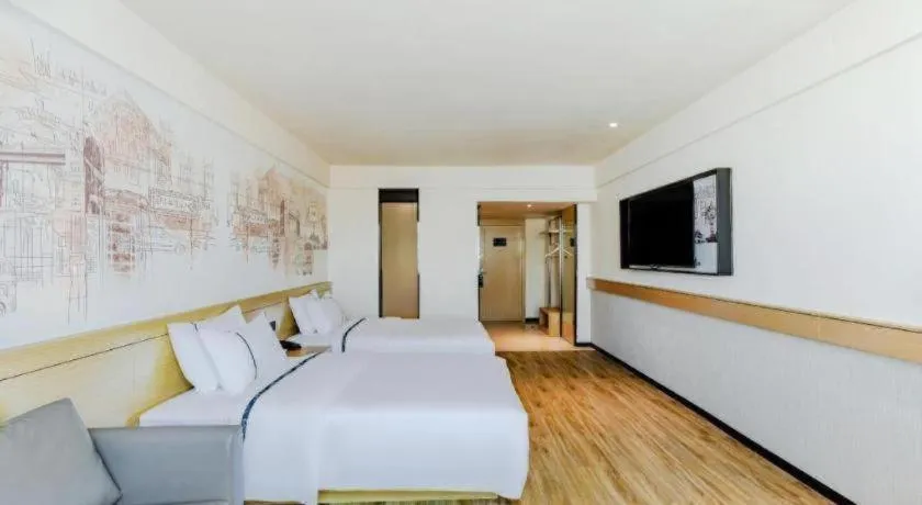 Bed in City Comfort Inn Shaorao Poyang