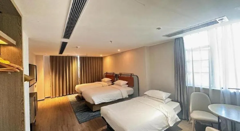 Bed in Echarm Hotel Guangzhou North Station Cultural Tourism City