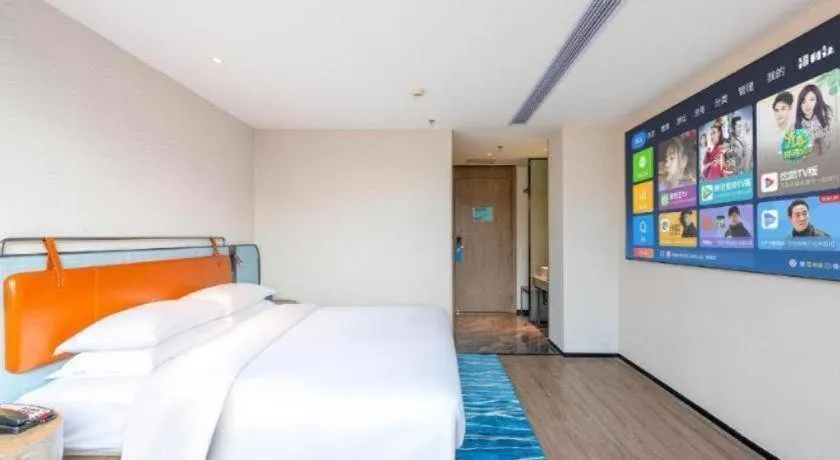 Bed in Echarm Hotel Guangzhou North Station Cultural Tourism City