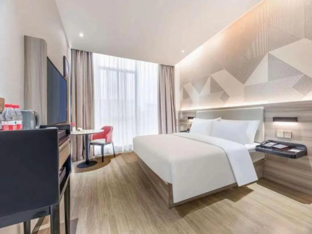 Bed in Borrman Hotel Suzhou Wujiang Zhongshan North Road Pedestrian Street