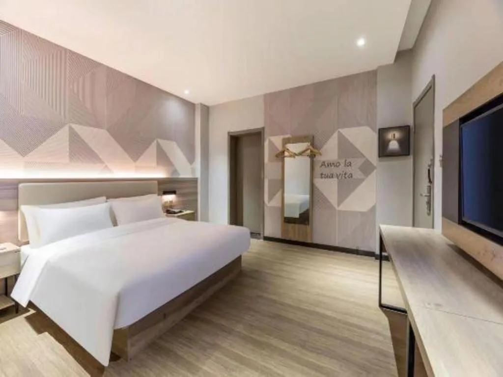 Bed in Borrman Hotel Suzhou Wujiang Zhongshan North Road Pedestrian Street