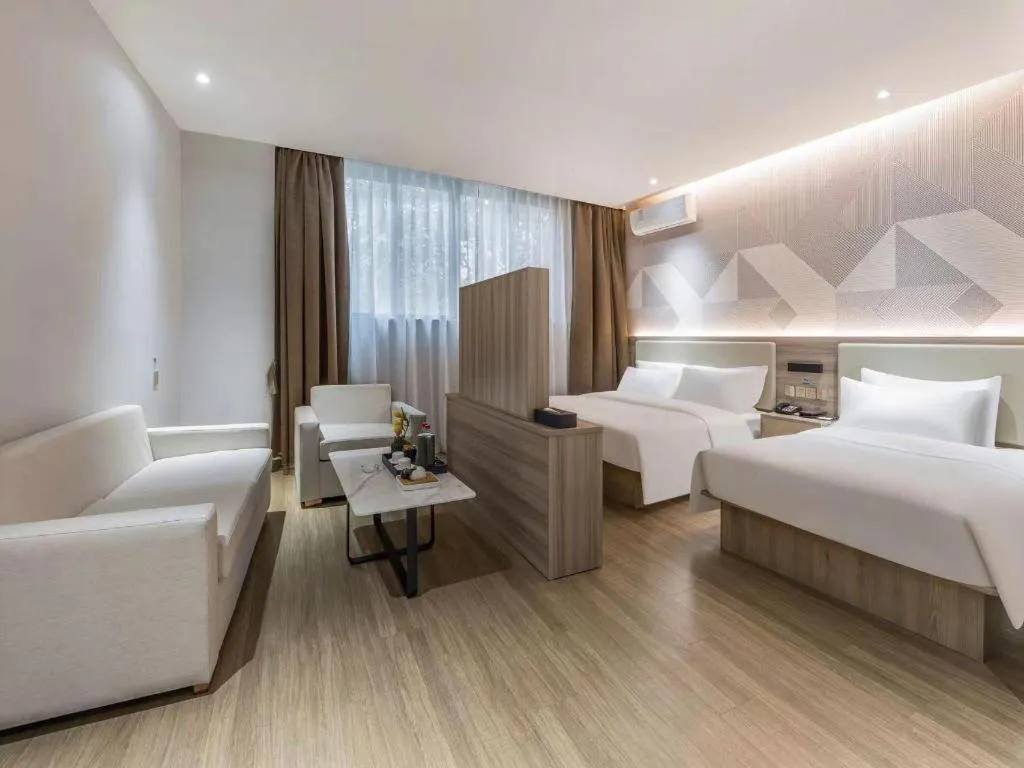 Bed in Borrman Hotel Suzhou Wujiang Zhongshan North Road Pedestrian Street