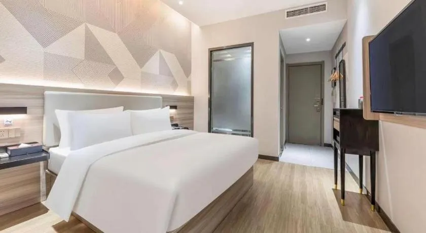 Bed in Borrman Hotel Suzhou Wujiang Zhongshan North Road Pedestrian Street