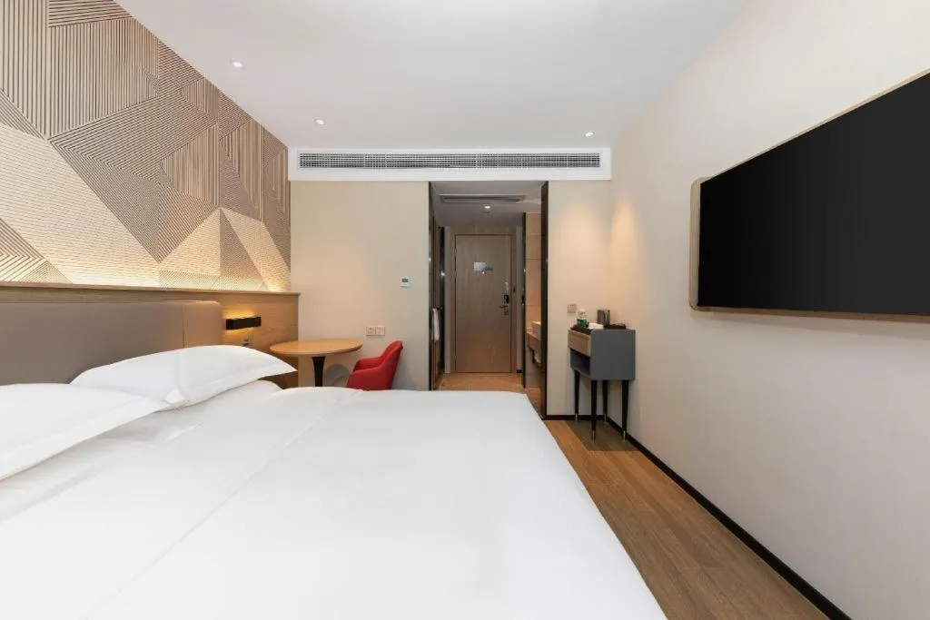 Bed in Borrman Hotel Wuhan First Hospital Hanzheng Street Metro Station