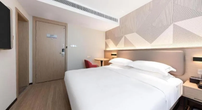 Bed in Borrman Hotel Wuhan First Hospital Hanzheng Street Metro Station