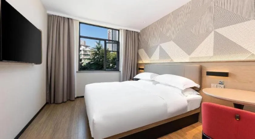 Bed in Borrman Hotel Wuhan First Hospital Hanzheng Street Metro Station
