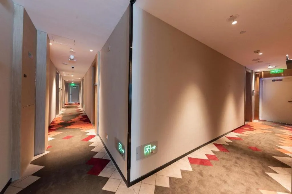 Bed in Borrman Hotel Wuhan First Hospital Hanzheng Street Metro Station