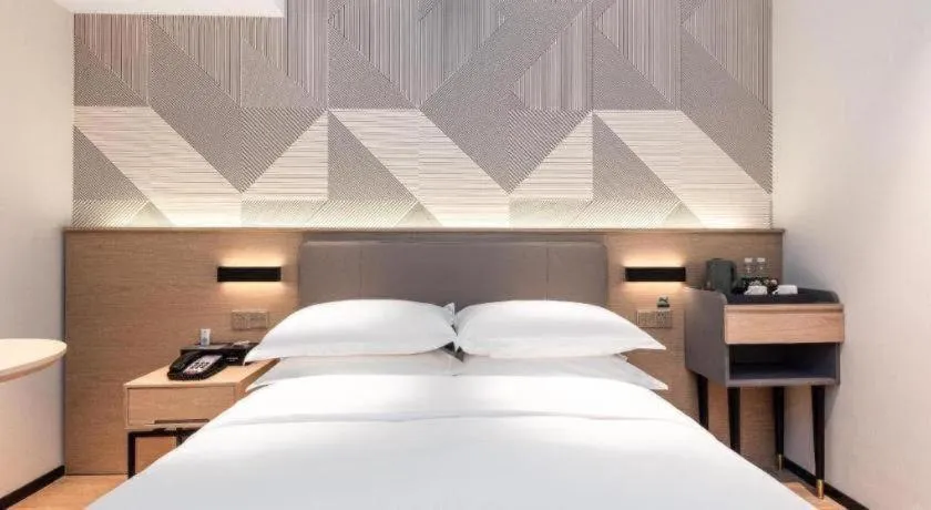 Bed in Borrman Hotel Wuhan First Hospital Hanzheng Street Metro Station