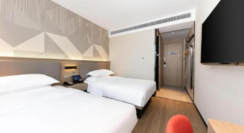 Bed in Borrman Hotel Wuhan First Hospital Hanzheng Street Metro Station