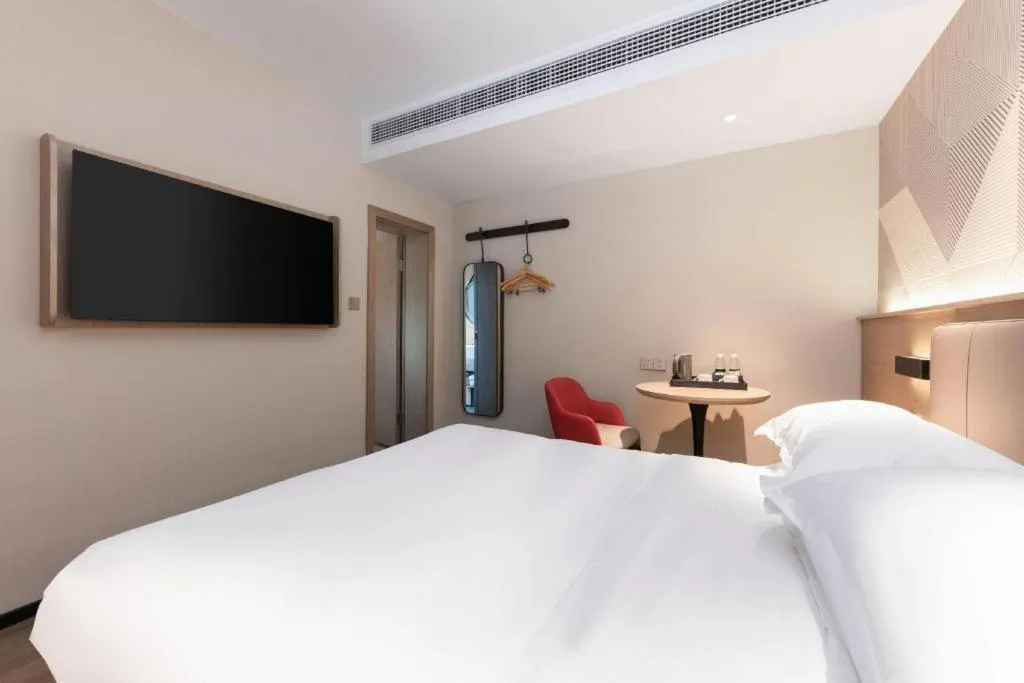 Bed in Borrman Hotel Wuhan First Hospital Hanzheng Street Metro Station