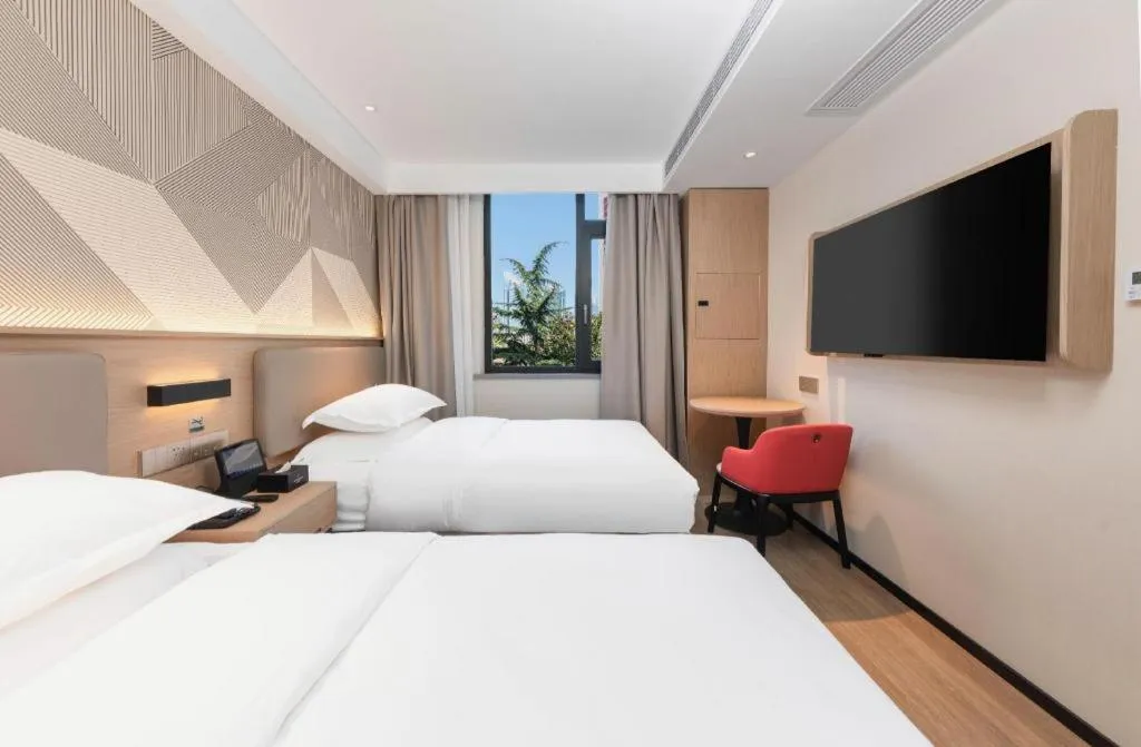 Bed in Borrman Hotel Wuhan First Hospital Hanzheng Street Metro Station