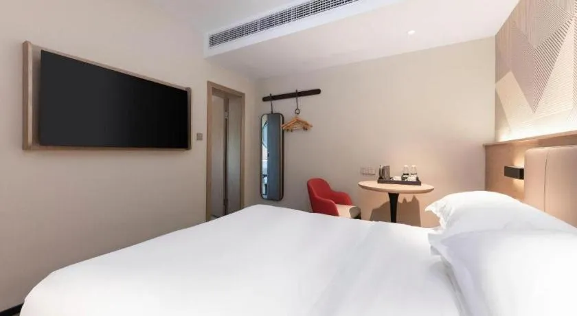 Bed in Borrman Hotel Wuhan First Hospital Hanzheng Street Metro Station