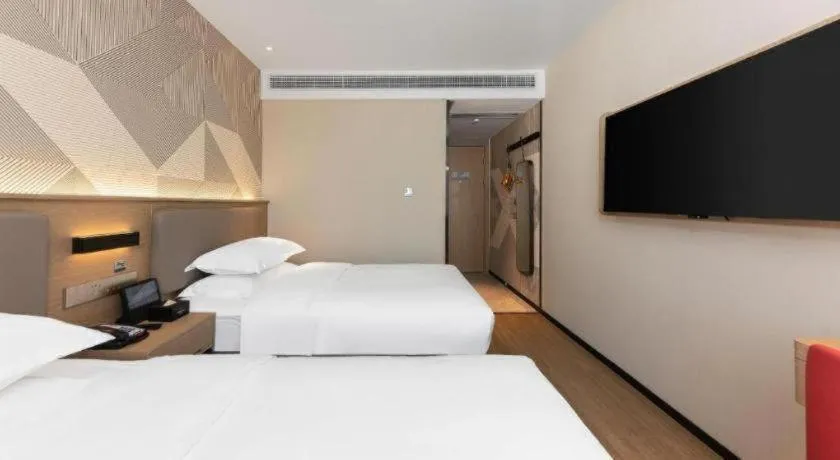 Bed in Borrman Hotel Wuhan First Hospital Hanzheng Street Metro Station