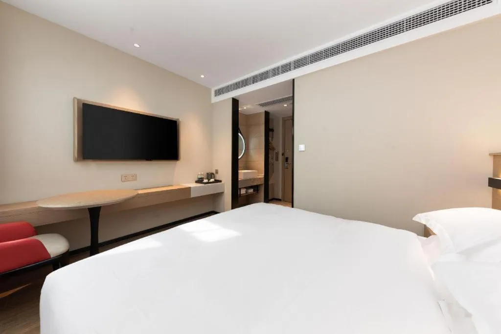 Bed in Borrman Hotel Wuhan First Hospital Hanzheng Street Metro Station