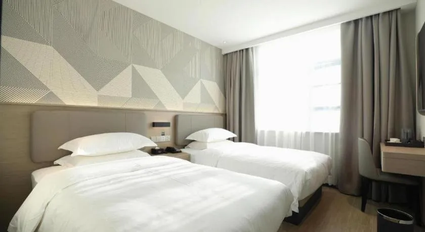 Bed in Borrman Hotel Wuhan First Hospital Hanzheng Street Metro Station