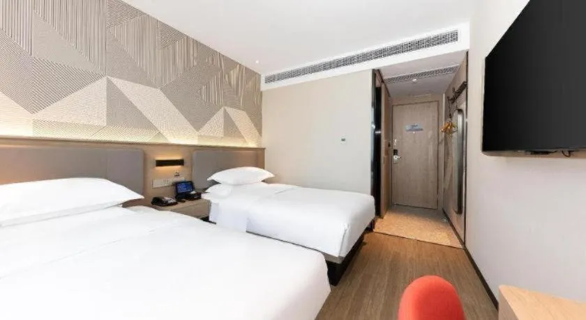 Bed in Borrman Hotel Wuhan First Hospital Hanzheng Street Metro Station