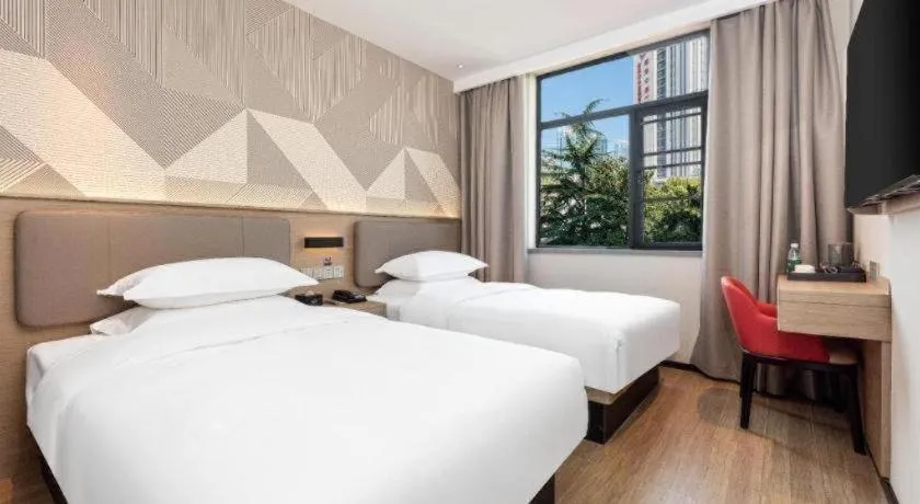 Bed in Borrman Hotel Wuhan First Hospital Hanzheng Street Metro Station