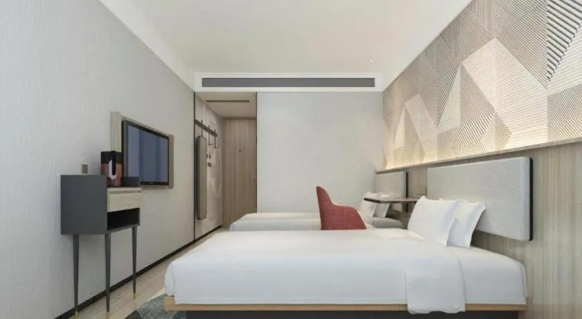 Bed in Borrman Hotel Wuhan First Hospital Hanzheng Street Metro Station