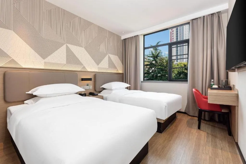 Bed in Borrman Hotel Wuhan First Hospital Hanzheng Street Metro Station