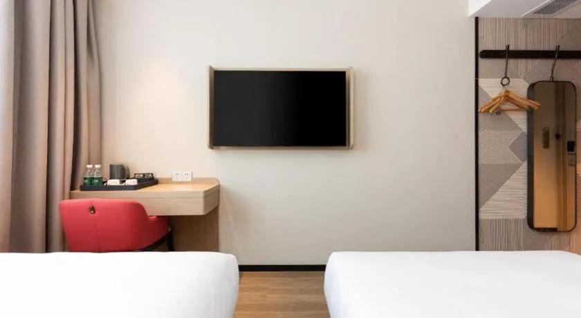 Bed in Borrman Hotel Wuhan First Hospital Hanzheng Street Metro Station