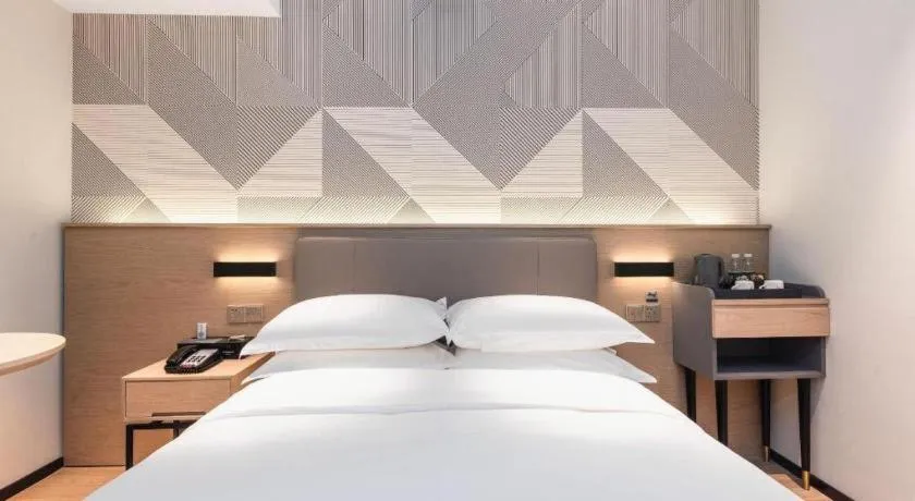 Bed in Borrman Hotel Wuhan First Hospital Hanzheng Street Metro Station
