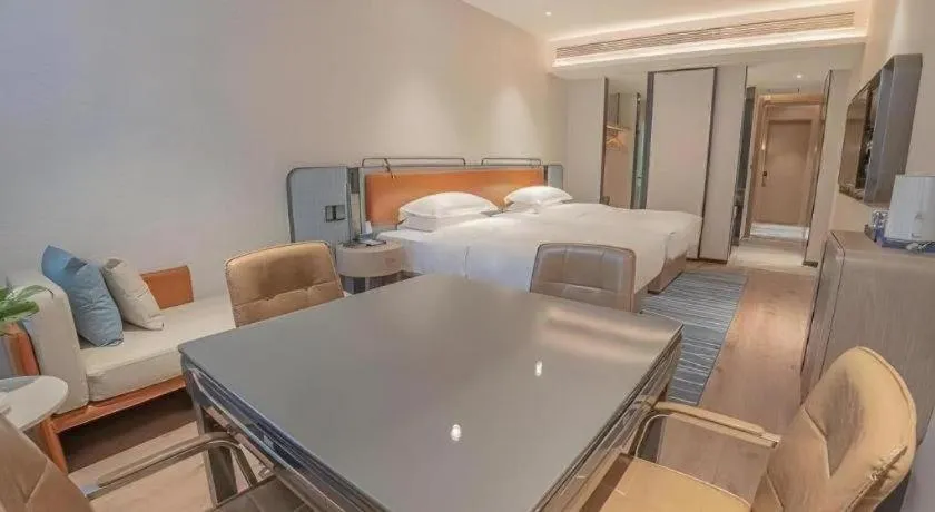 Bed in Echarm Hotel Zigong Machishui Wanda Plaza