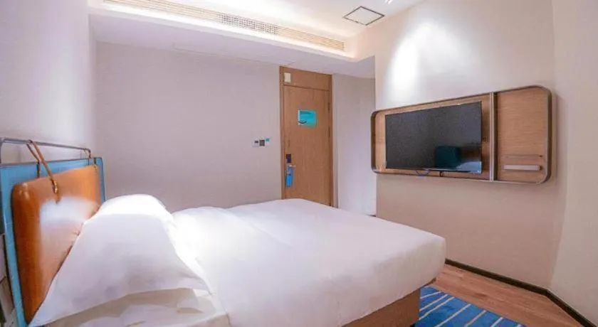 Bed in Echarm Hotel Zigong Machishui Wanda Plaza