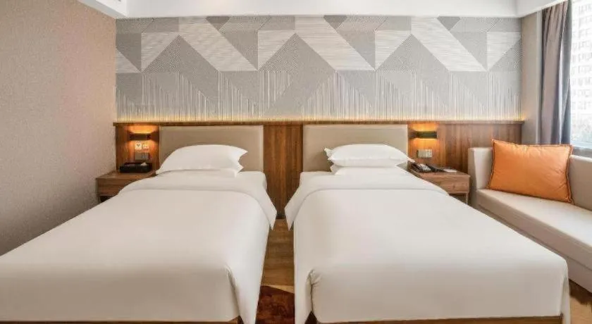 Bed in Borrman Hotel Zoucheng Huamaowan Mall