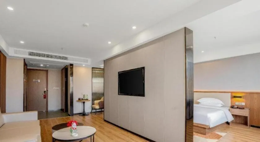 Bed in Borrman Hotel Zoucheng Huamaowan Mall