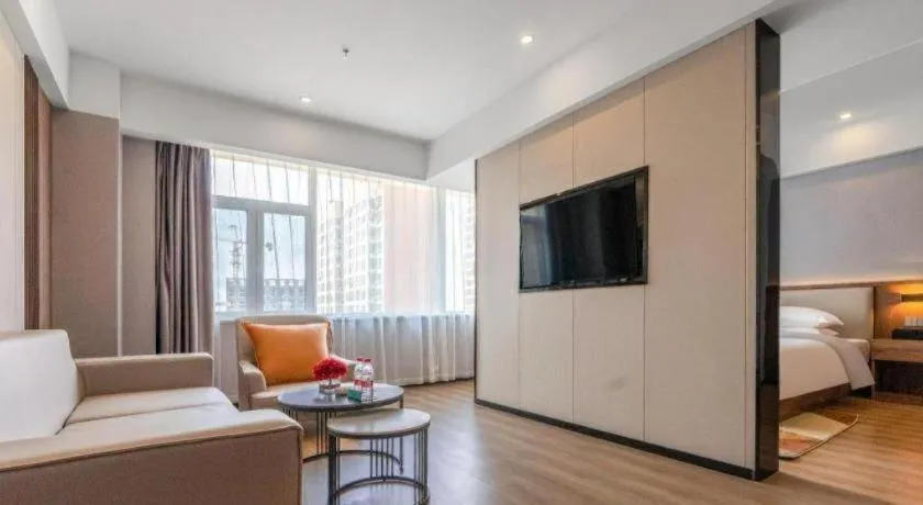 Bed in Borrman Hotel Zoucheng Huamaowan Mall