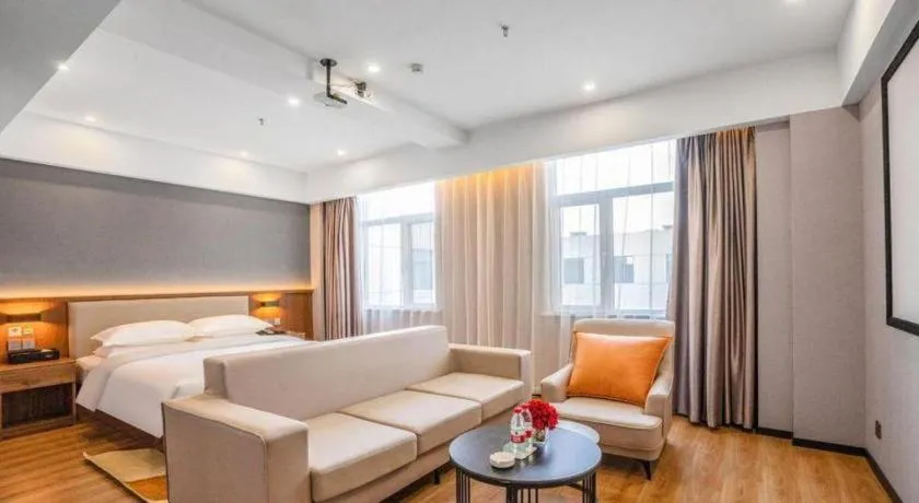 Bed in Borrman Hotel Zoucheng Huamaowan Mall