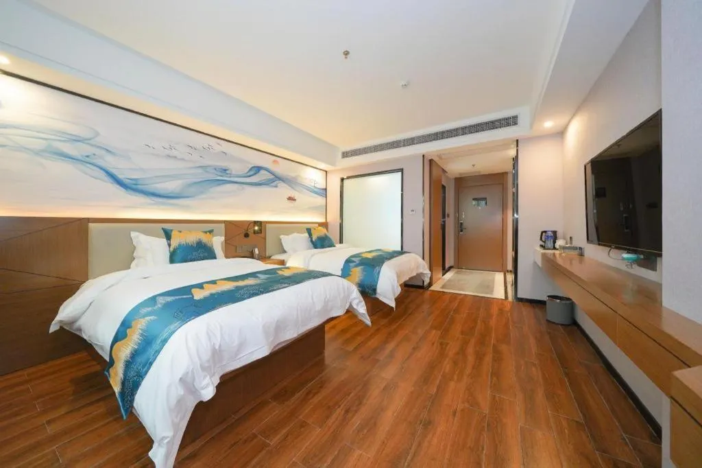 Bed in Borrman Hotel Nanning Anji Passenger Station Xijin Metro Station