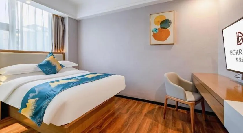Bed in Borrman Hotel Nanning Anji Passenger Station Xijin Metro Station