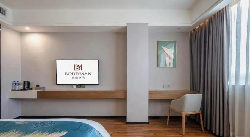 Bed in Borrman Hotel Nanning Anji Passenger Station Xijin Metro Station