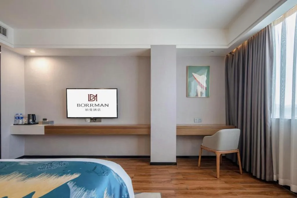 Bed in Borrman Hotel Nanning Anji Passenger Station Xijin Metro Station