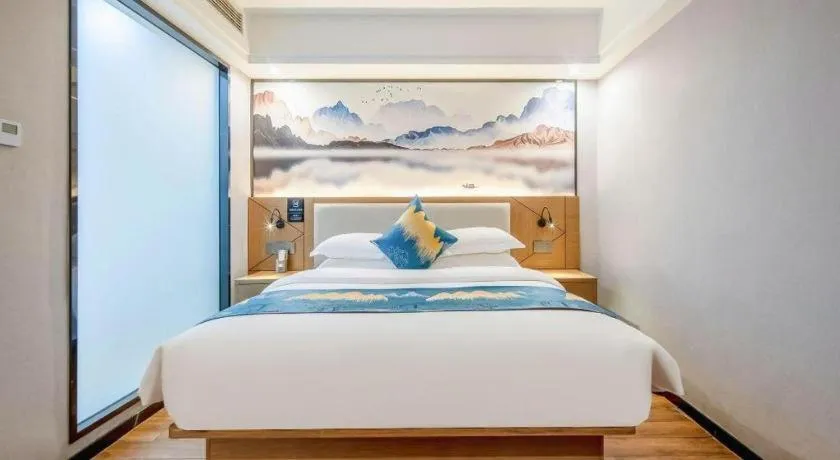 Bed in Borrman Hotel Nanning Anji Passenger Station Xijin Metro Station