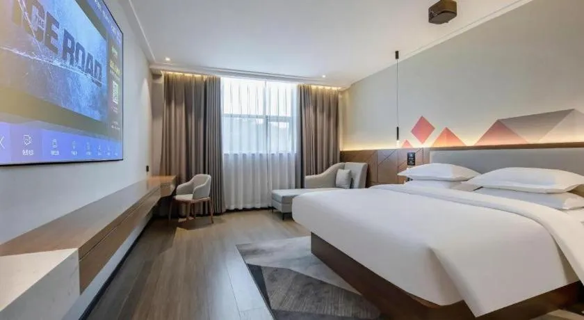 Bed in Borrman Hotel Nanning Anji Passenger Station Xijin Metro Station