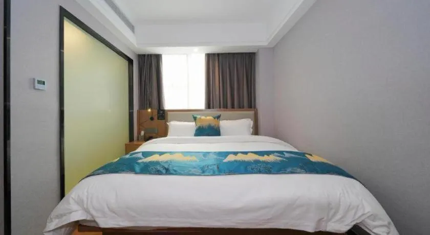 Bed in Borrman Hotel Nanning Anji Passenger Station Xijin Metro Station
