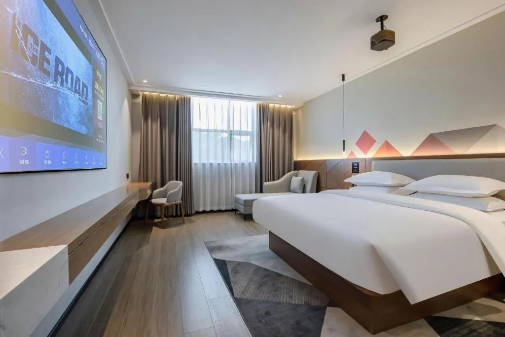 Bed in Borrman Hotel Nanning Anji Passenger Station Xijin Metro Station